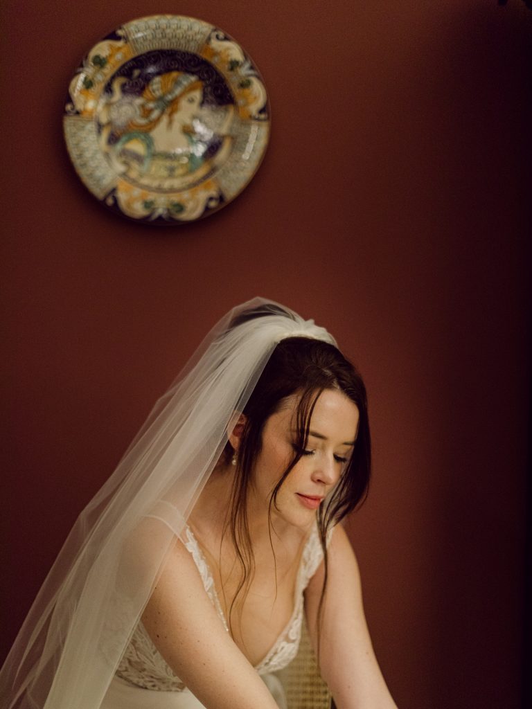 Bride getting ready at Tivoli Palazzo Gaddi decorated for Christmas in Florence