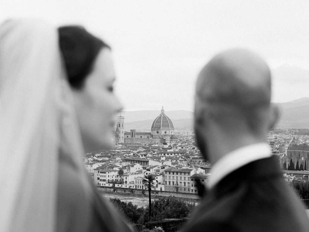 Emotional elopement ceremony overlooking Florence at Christmas