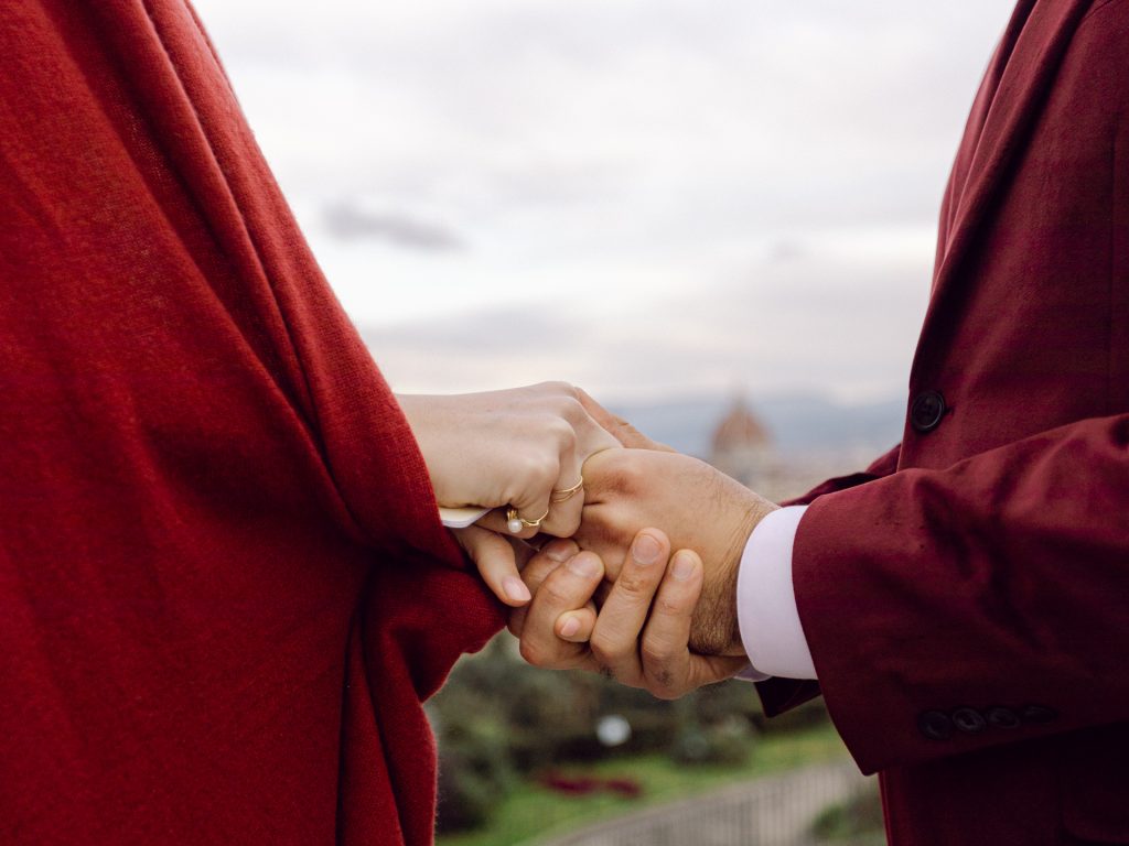 Emotional elopement ceremony overlooking Florence at Christmas