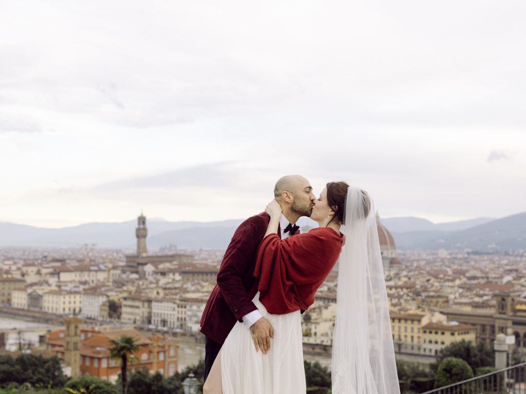 An emotional elopement ceremony overlooking Florence at Christmas, Tuscany
