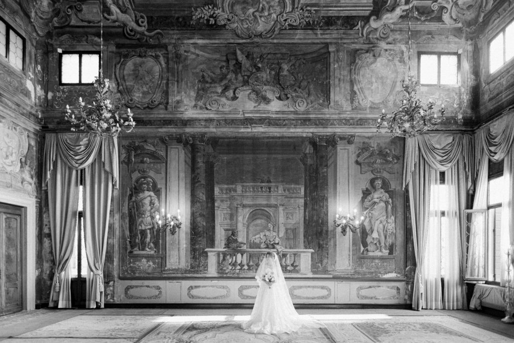Bride getting ready in Ca' Sagredo Venice black and white