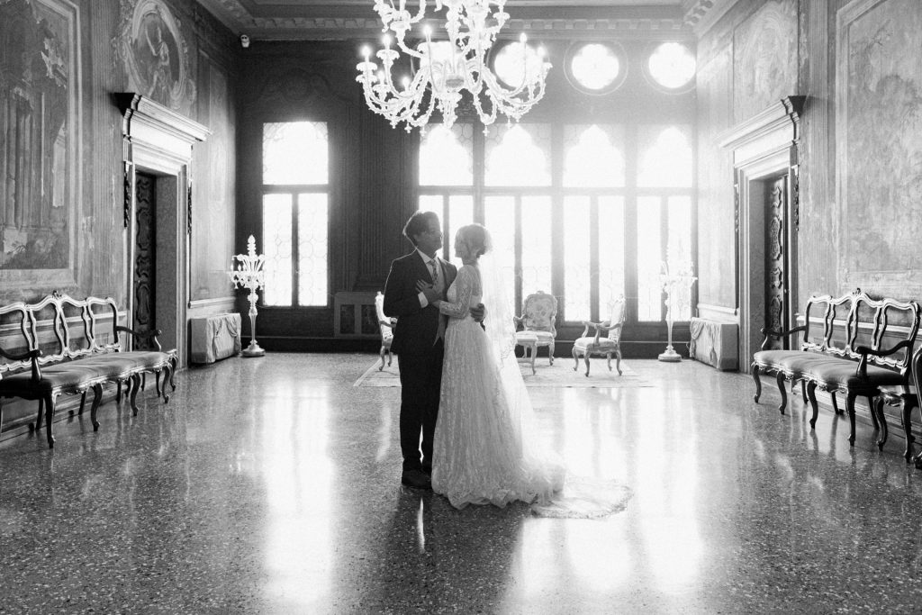 Bride and groom in Ca' Sagredo hotel, Venice